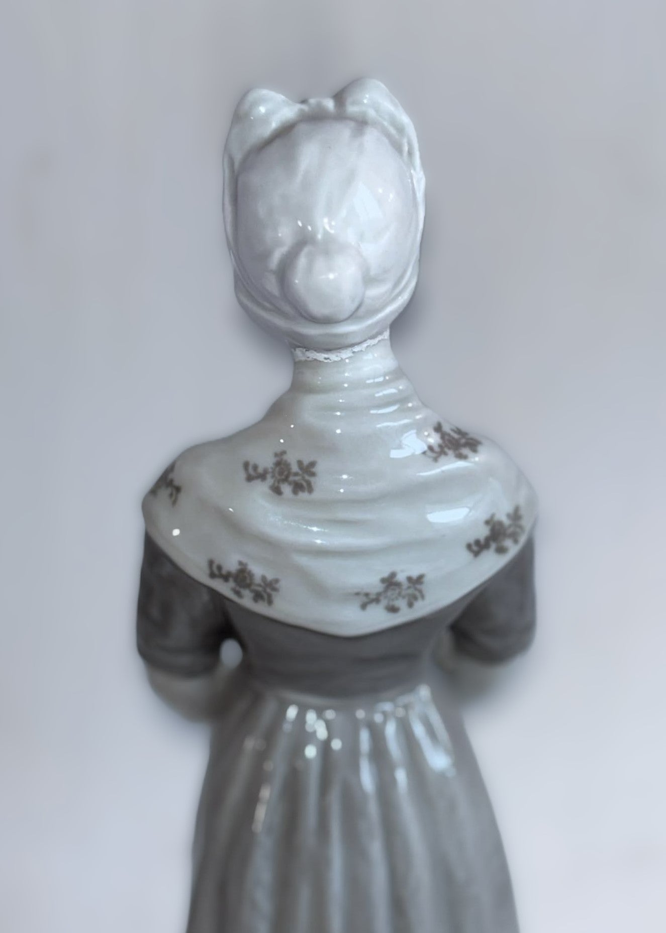 Heubach porcelain figurine of a young woman