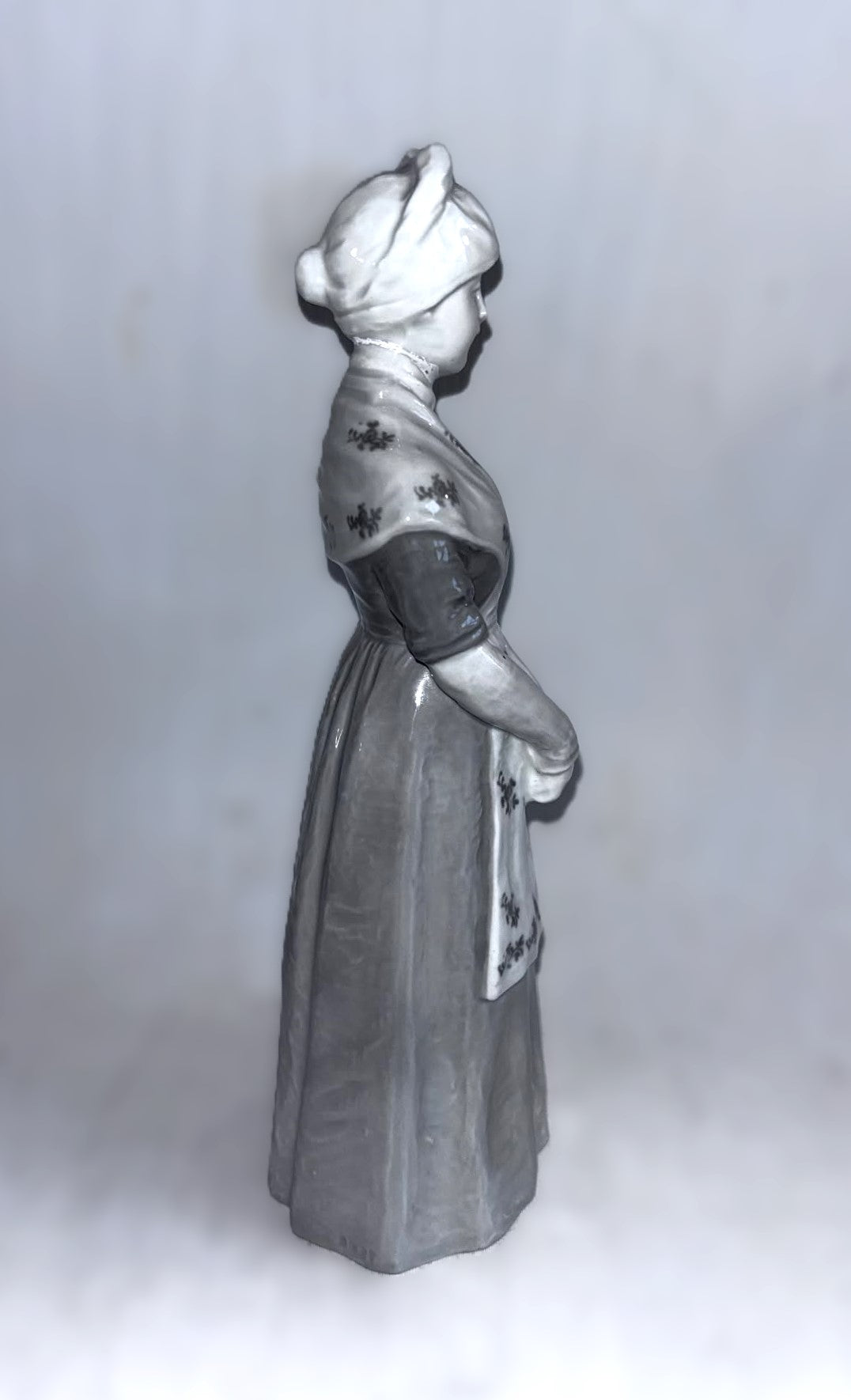 Heubach porcelain figurine of a young woman