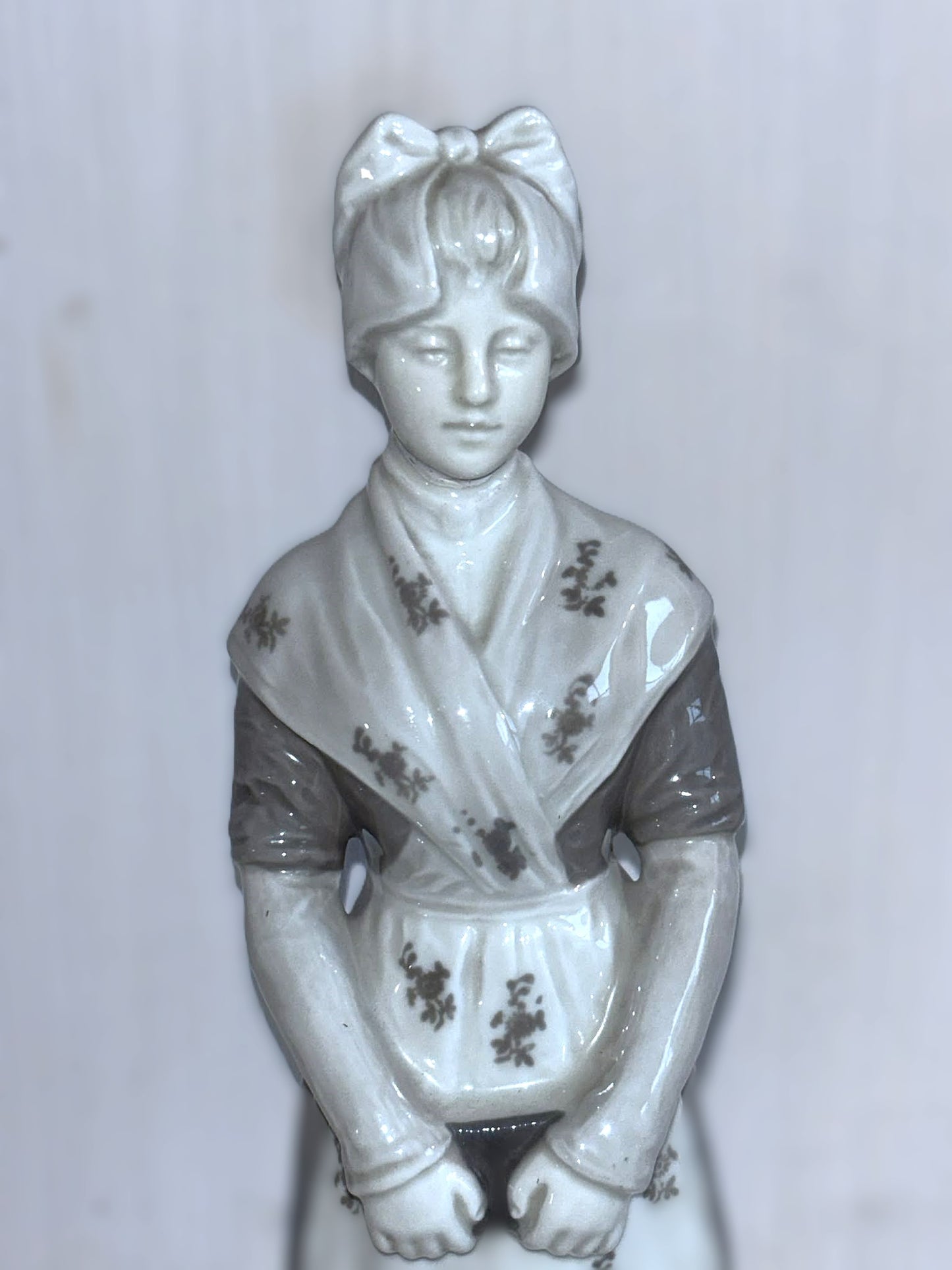 Heubach porcelain figurine of a young woman