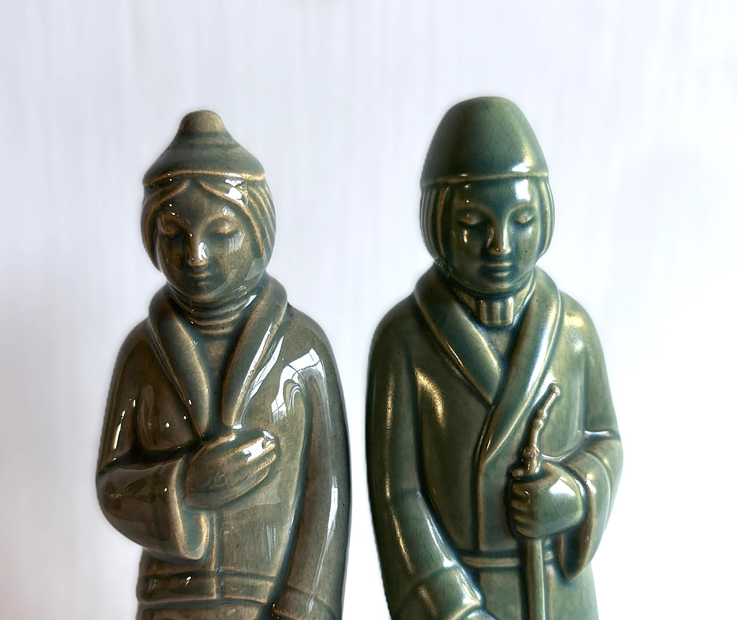 A pair of beautiful green glazed salt and pepper shakers in East Asian style, designed by Svend Lindhart (1898-1989)