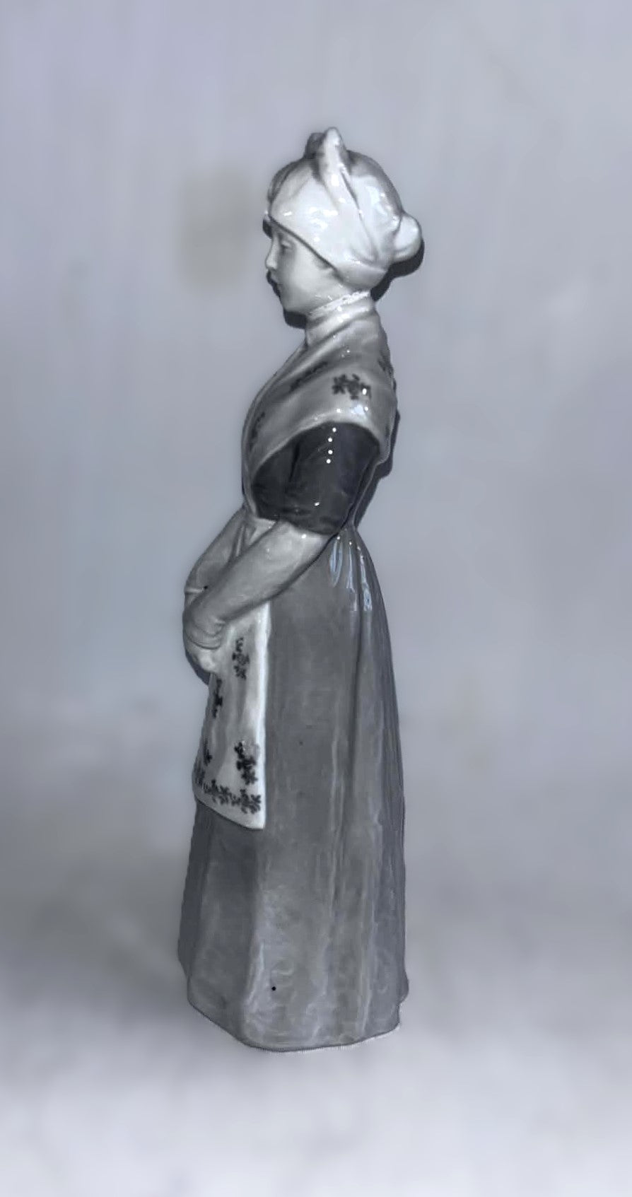 Heubach porcelain figurine of a young woman