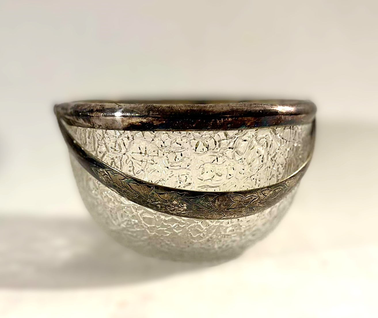 Beautiful old sugar bowl made of cracked glass and with silver plated rim and handle