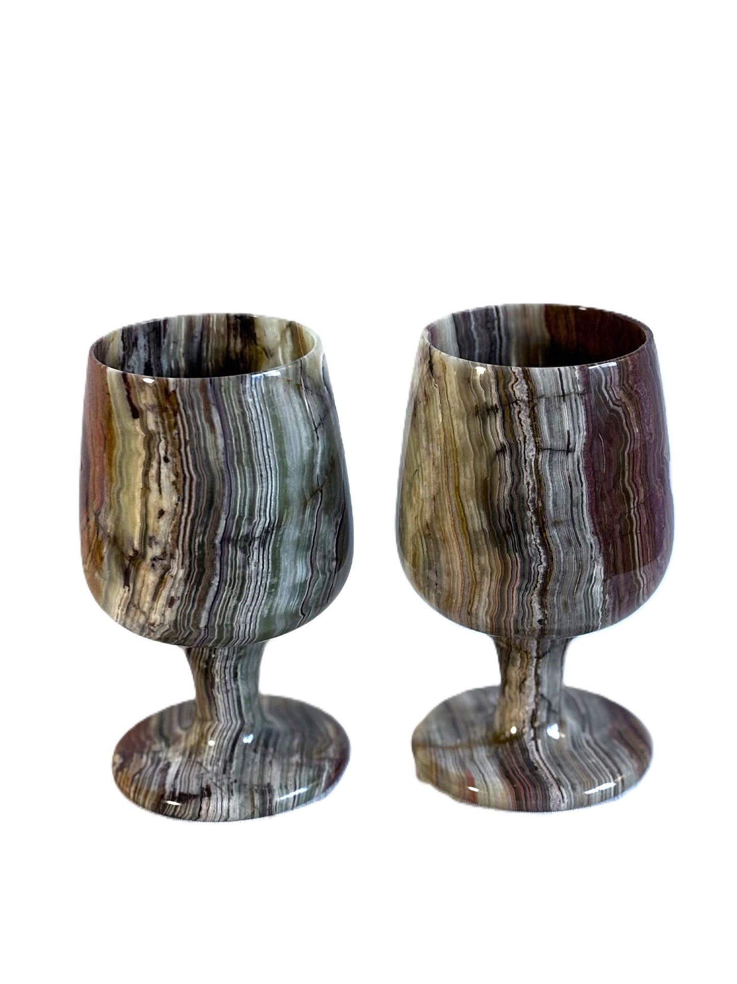 A pair of beautiful old wine glasses, made of heavy reddish marble