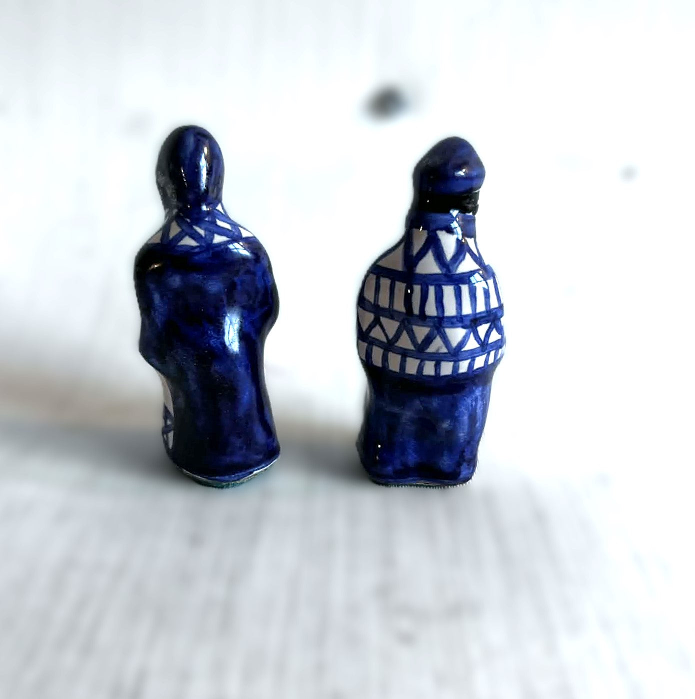 A pair of small handmade Gzhel ceramic figurines from the USSR