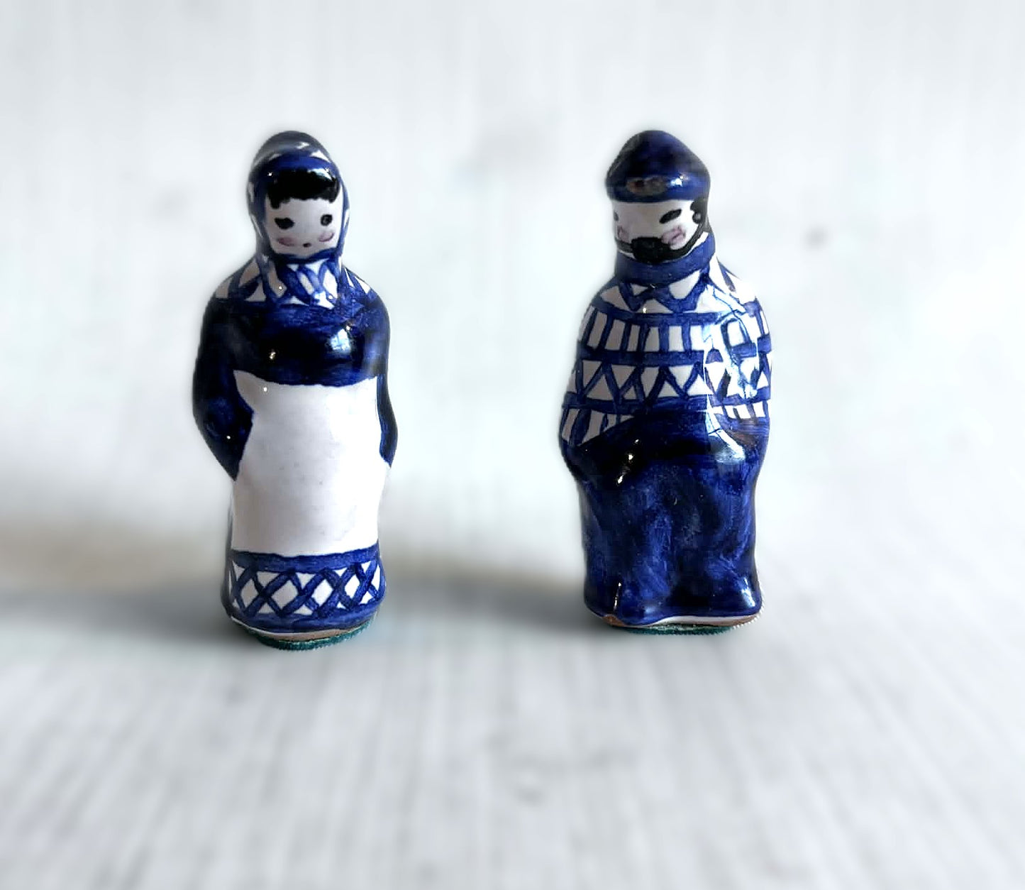 A pair of small handmade Gzhel ceramic figurines from the USSR