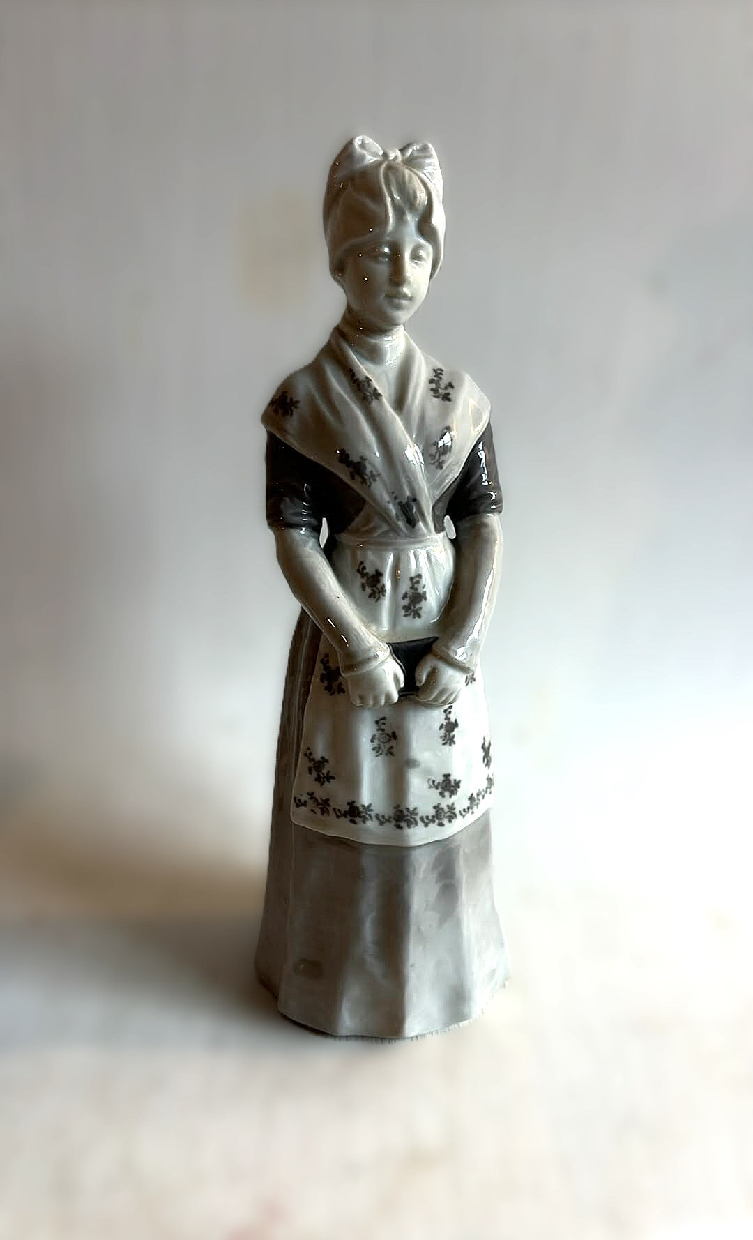 Heubach porcelain figurine of a young woman