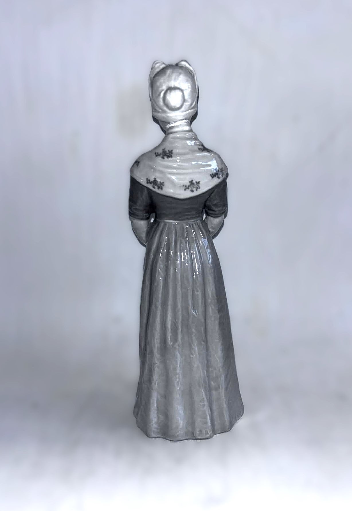 Heubach porcelain figurine of a young woman