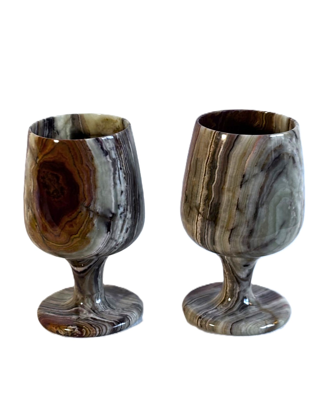 A pair of beautiful old wine glasses, made of heavy reddish marble