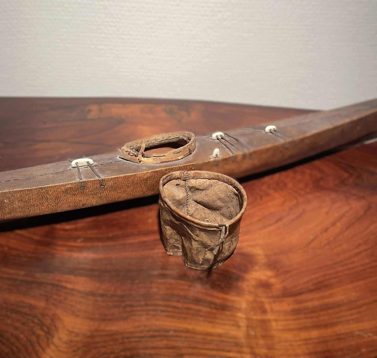 Greenlandic miniature model of kayak, made of leather, bone and wood - no. 030200