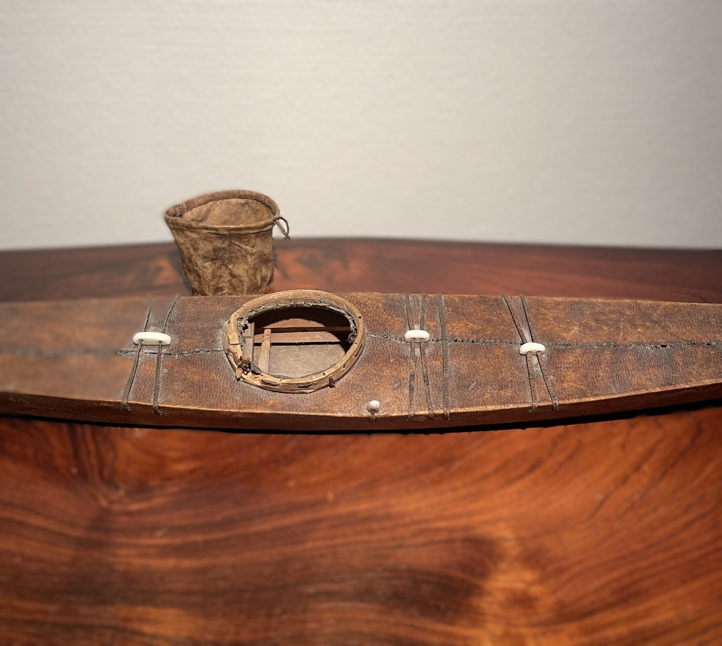 Greenlandic miniature model of kayak, made of leather, bone and wood - no. 030200